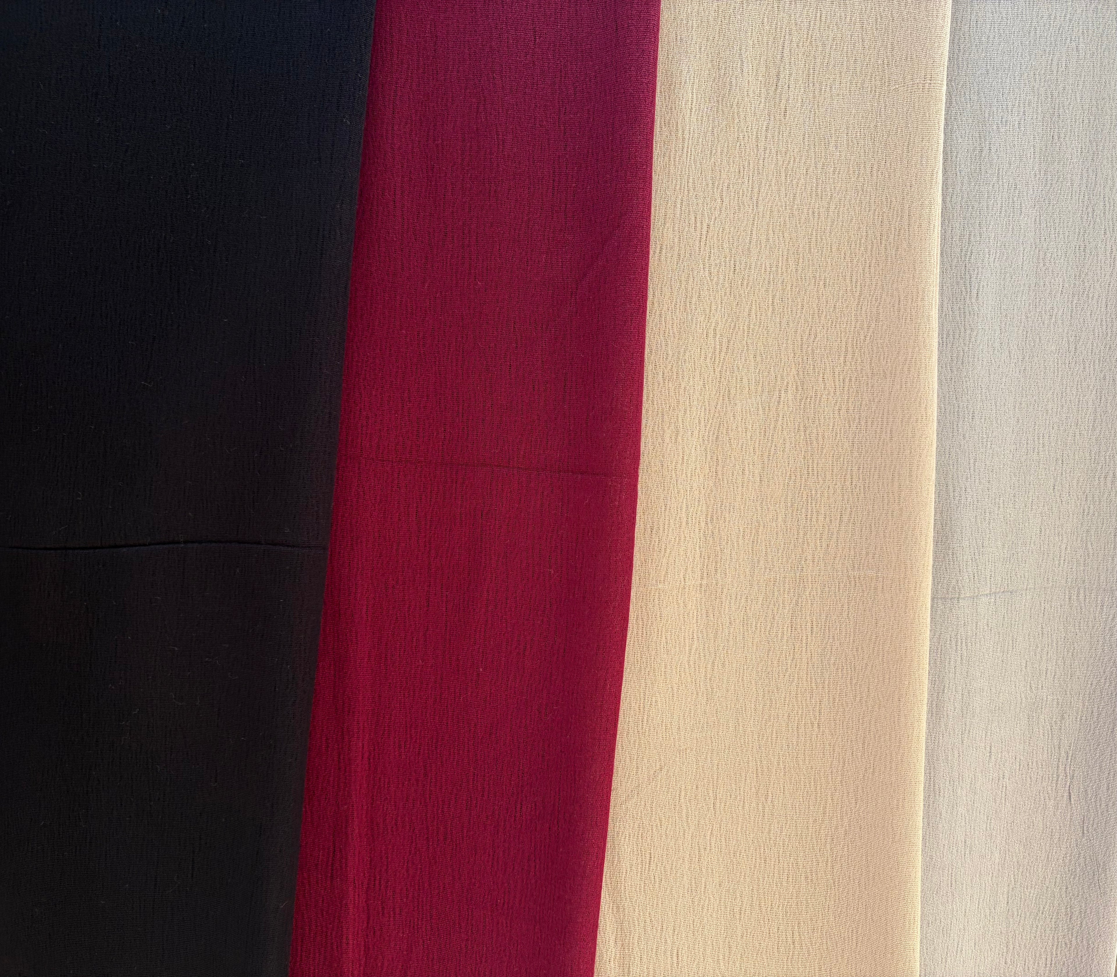 Colors of the essential cotton scarf. Grey, Burgundy, black, and beige.